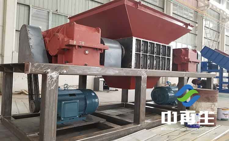 生活垃圾撕碎機磨盤間隙壓緊調(diào)節(jié)機構(gòu)設計